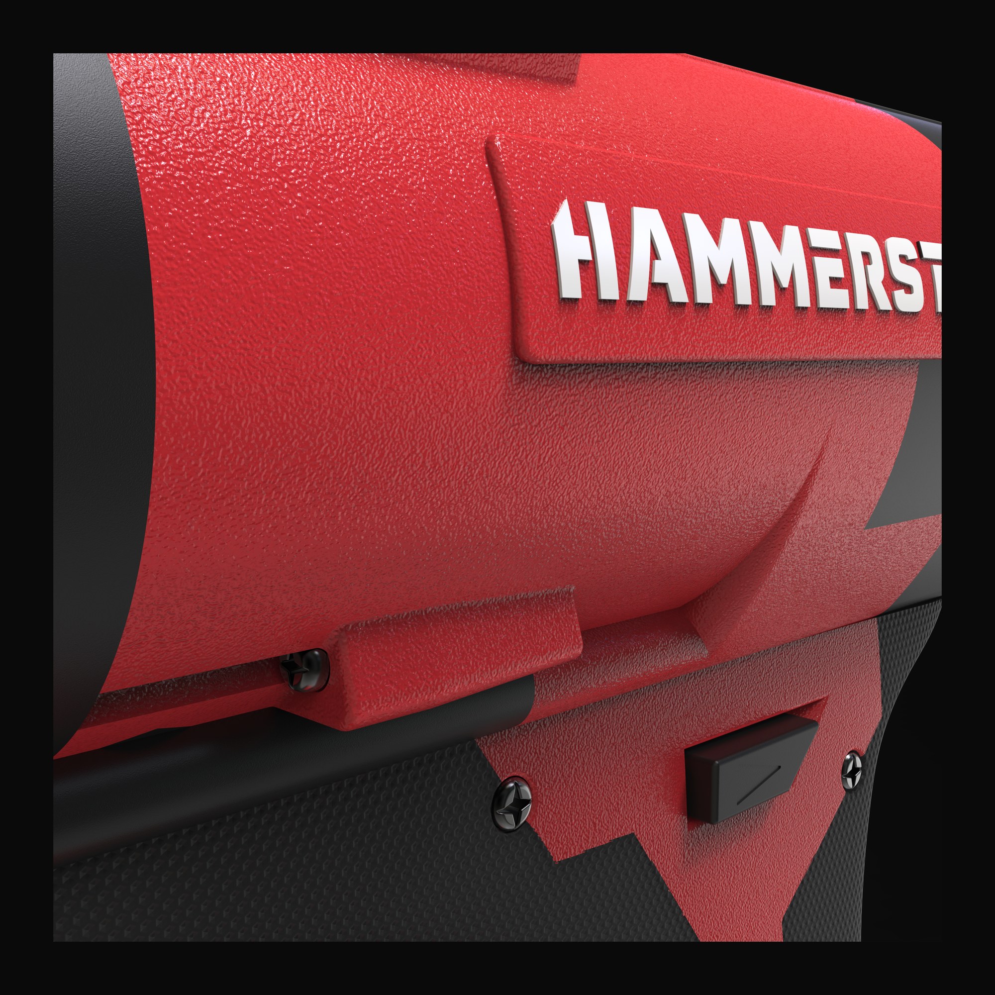 Close-up of the Hammerstone wordmark on the textured red housing